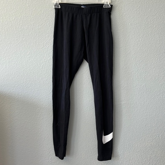 Nike Pants - Nike women’s size S cotton leggings. Black with white swoosh on bottom l…